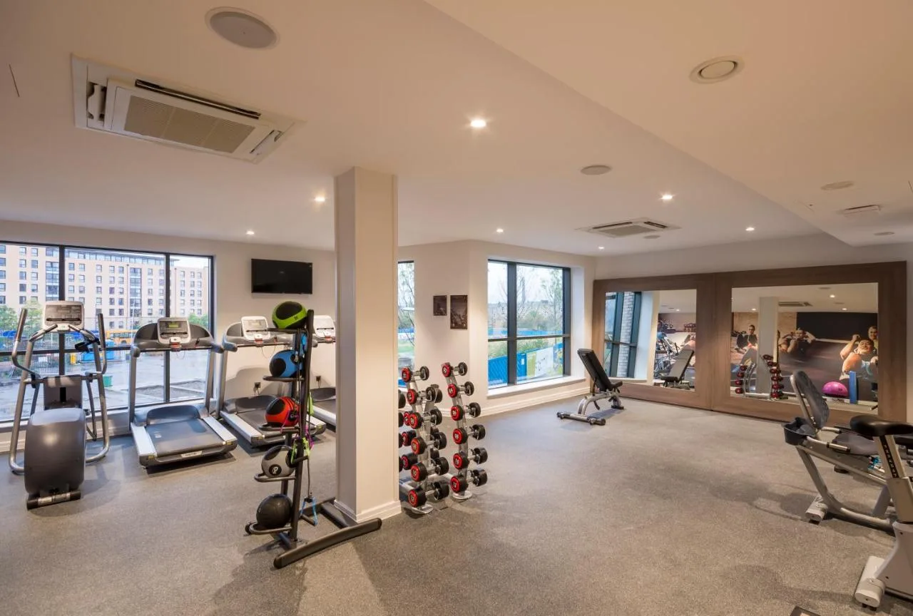 A gym with treadmills and cardio equipment at Hampton by Hilton Edinburgh West End